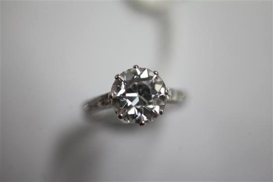 A 1940s/1950s platinum and single stone diamond ring with diamond set shoulders, size L.